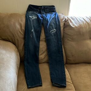 Women's Distressed Blue Jeans